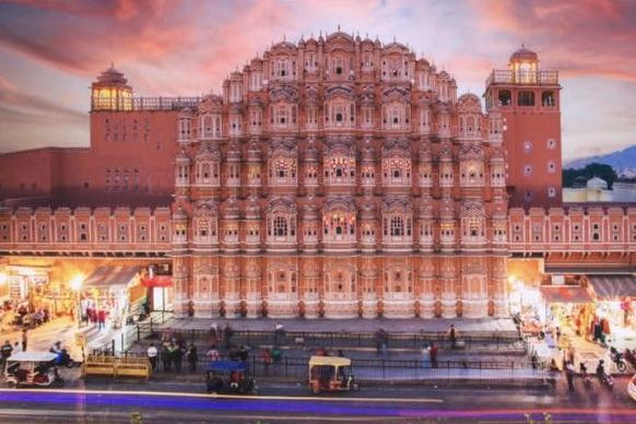 Hawa Mahal, the pink sandstone palace facade in Jaipur, Rajasthan, at dusk